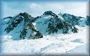 Left to right: Mayakovsky Peak, Ordgenikidze Peak, Partizan Peak